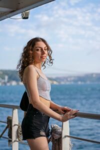solo cruise traveler enjoying balcony ocean view